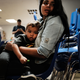 A woman who idendtified herself as Jennifer sits with her son Jaydan at the Catholic Charities Humanitarian Respite Center after recently crossing the U.S., Mexico border on June 21, 2018 in McAllen, Texas